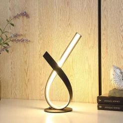 17 in. Black Metal Abstract Upright Ribbon Bow LED Table Lamp by ORE International -Armacost Lighting Shop black ore international table lamps hbl2379 4f 1000