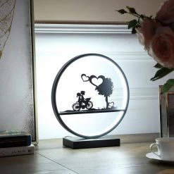 13 in. Girl And Boy On Bicycle LED Accent Table Lamp by ORE International -Armacost Lighting Shop matte black ore international table lamps hbl2155b 1f 1000