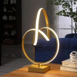 19 in. Matte Gold Abstract Infinity Modern Table Lamp by ORE International -Armacost Lighting Shop matte gold ore international table lamps hbl2541 4f 1000