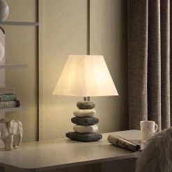 17.5 in. Coastal Darya Cloudy Gray/White Stacked Pebble Ceramic Table Lamp by ORE International 8 17.5 in. Coastal Darya Cloudy Gray/White Stacked Pebble Ceramic Table Lamp by ORE International -Armacost Lighting Shop white ore international table lamps hbl2546 4f 1000